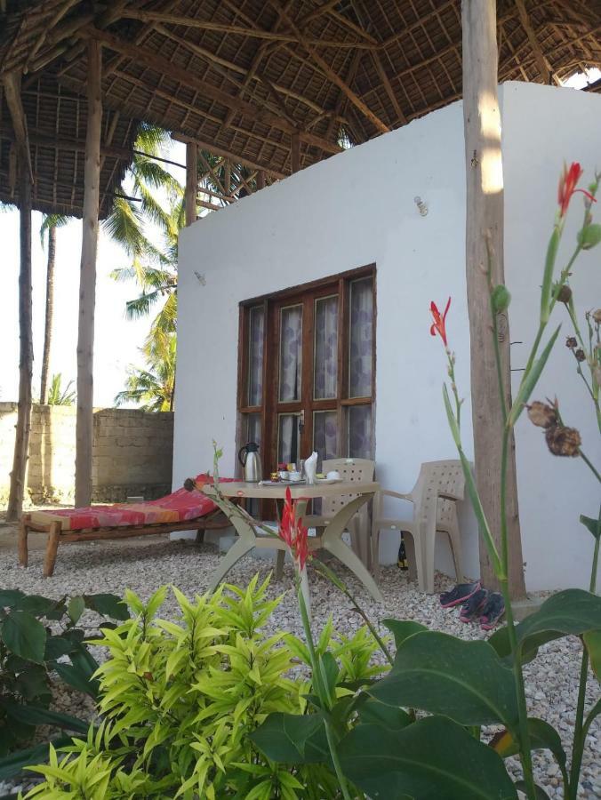 Malik Villa-matemwe And Restaurant Gasthof